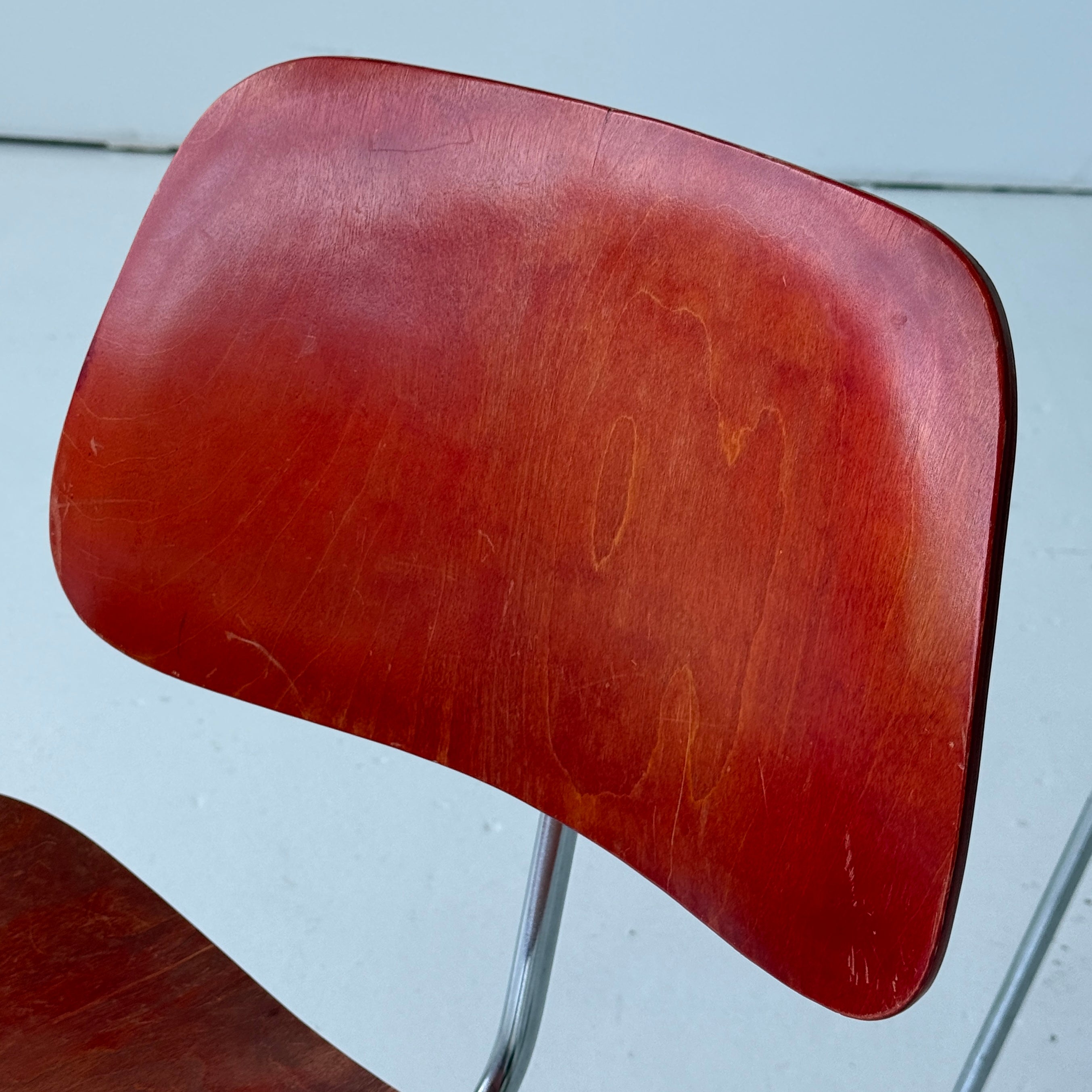 DCM Chairs by Charles + Ray Eames for Herman Miller in Red Aniline Dye