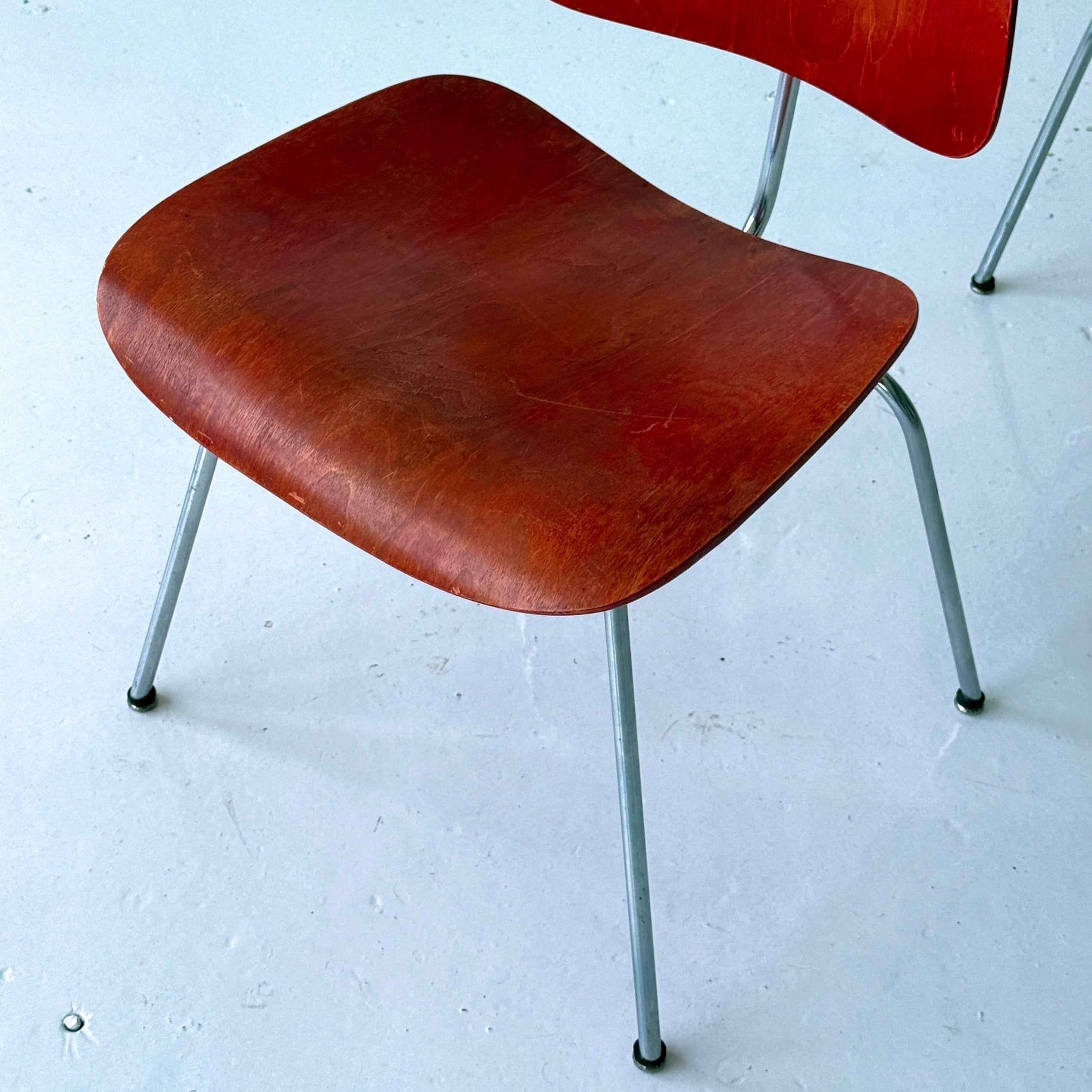 DCM Chairs by Charles + Ray Eames for Herman Miller in Red Aniline Dye