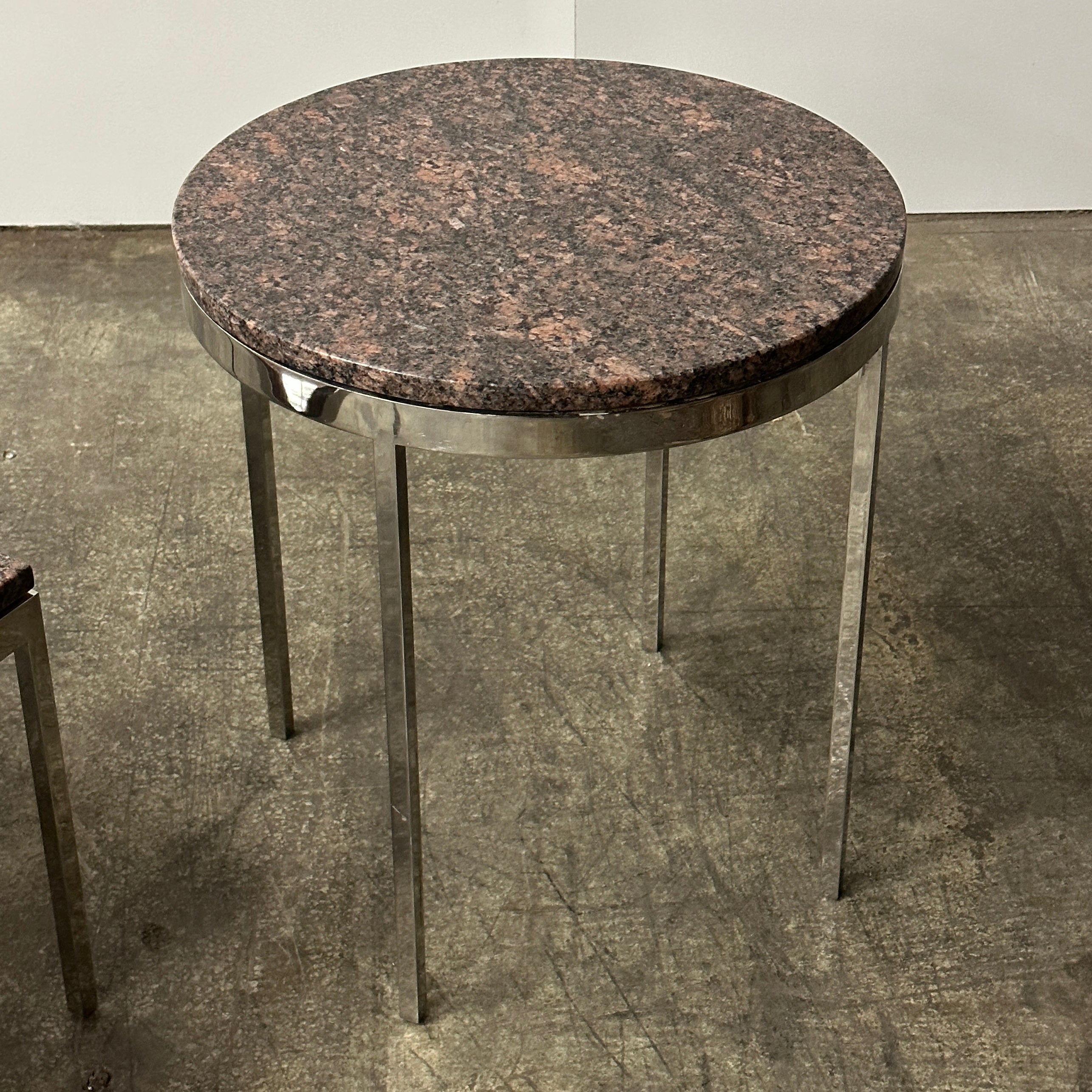 Red Granite + Chrome Tables by Nicos Zographos