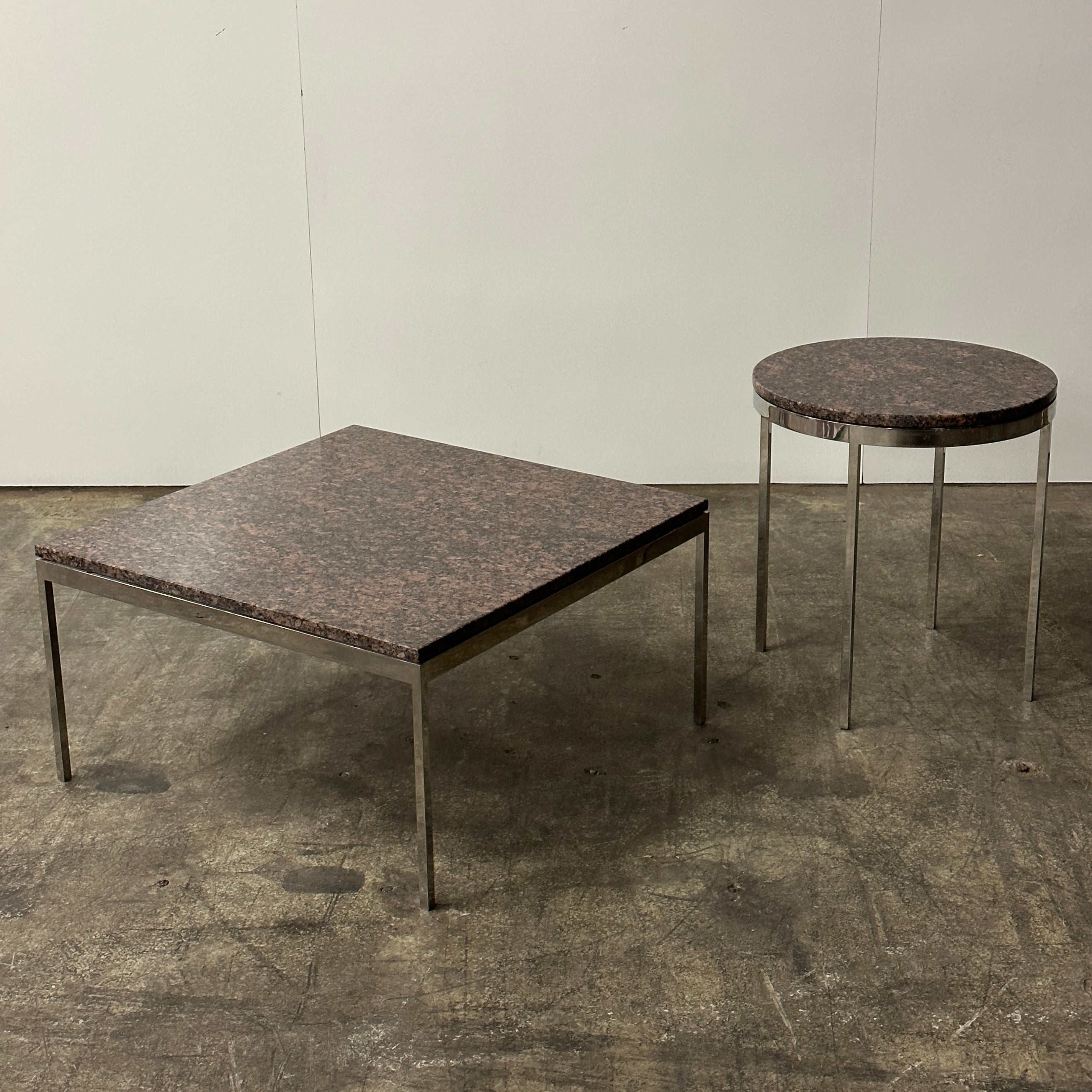 Red Granite + Chrome Tables by Nicos Zographos