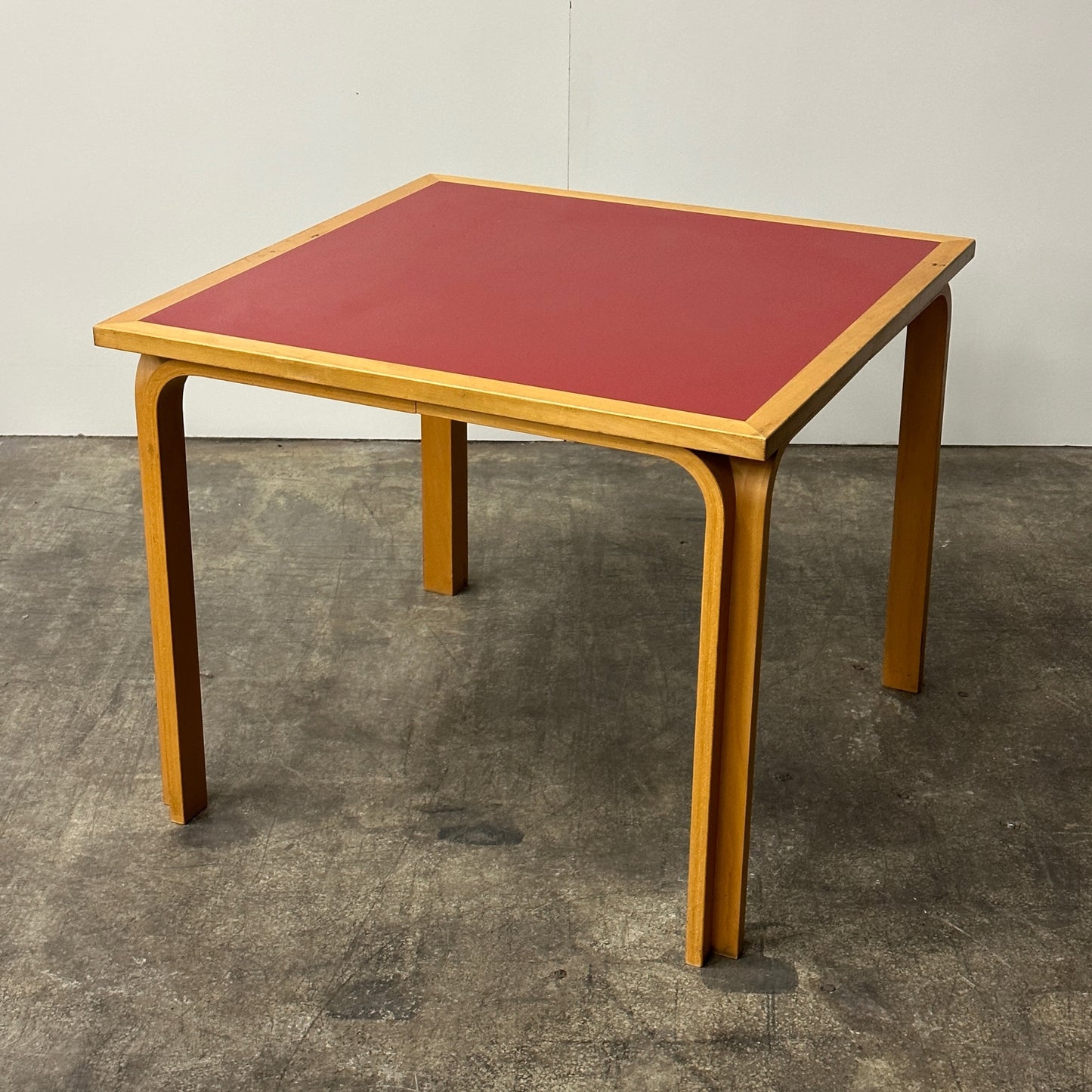 Square Red Table by Rud Thygesen and Johnny Sørensen for Magnus Olesen