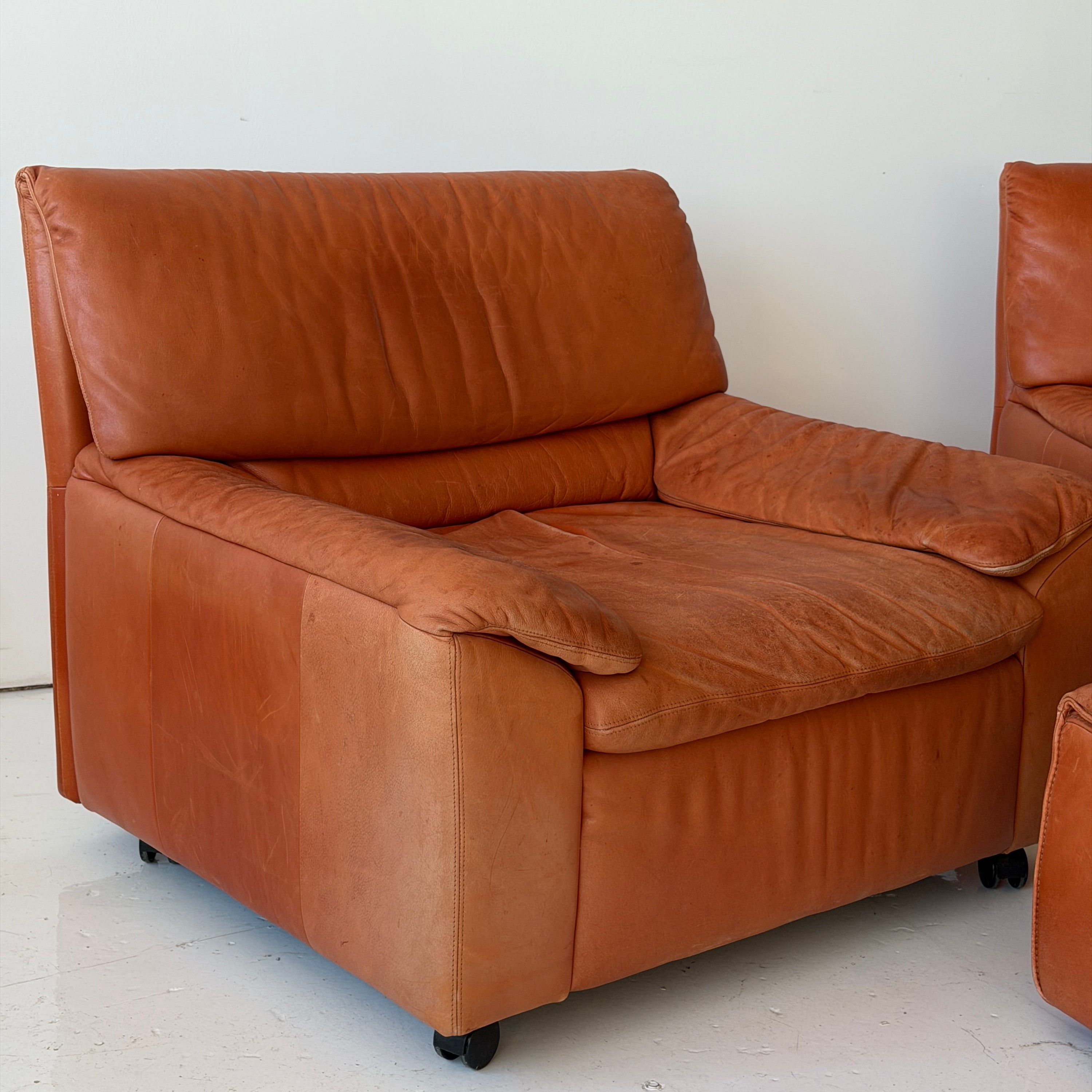 German Orange Leather Lounge Chairs + Ottoman by Dreipunkt