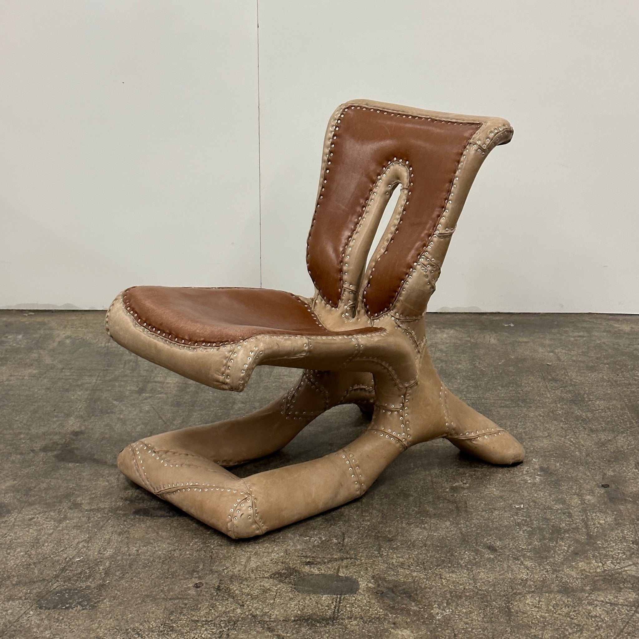Riveted Saddle Leather Lounge Chair