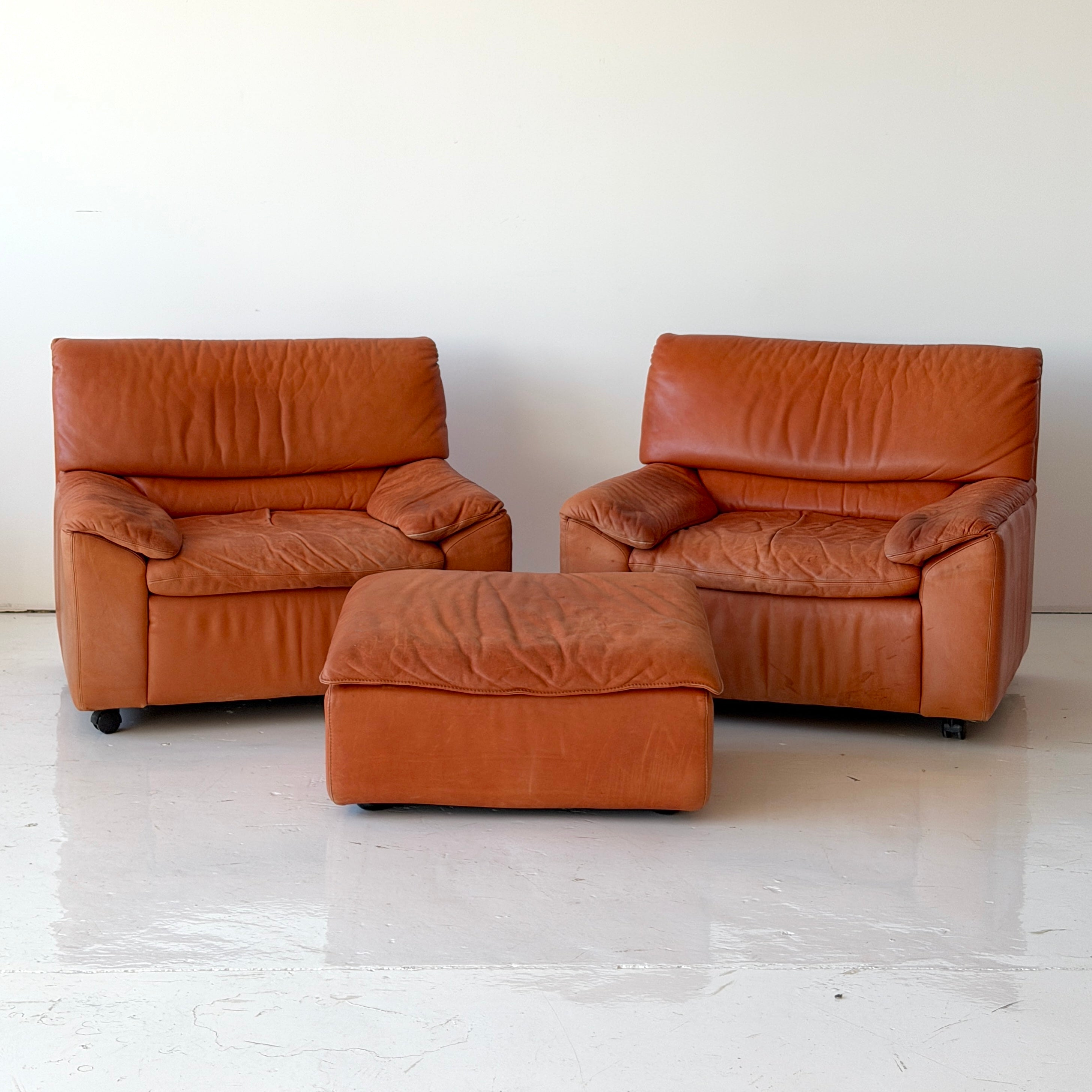 German Orange Leather Lounge Chairs + Ottoman by Dreipunkt