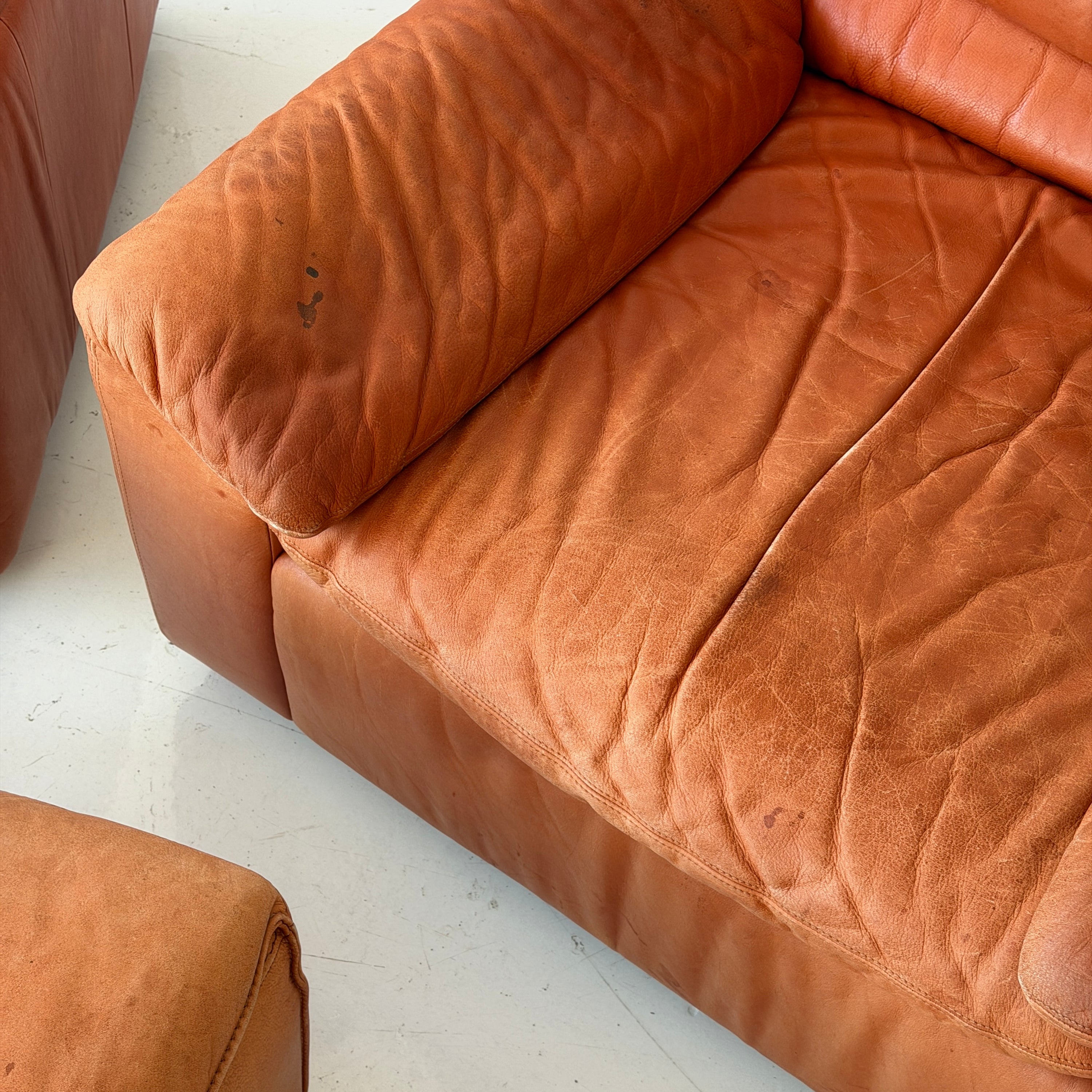German Orange Leather Lounge Chairs + Ottoman by Dreipunkt