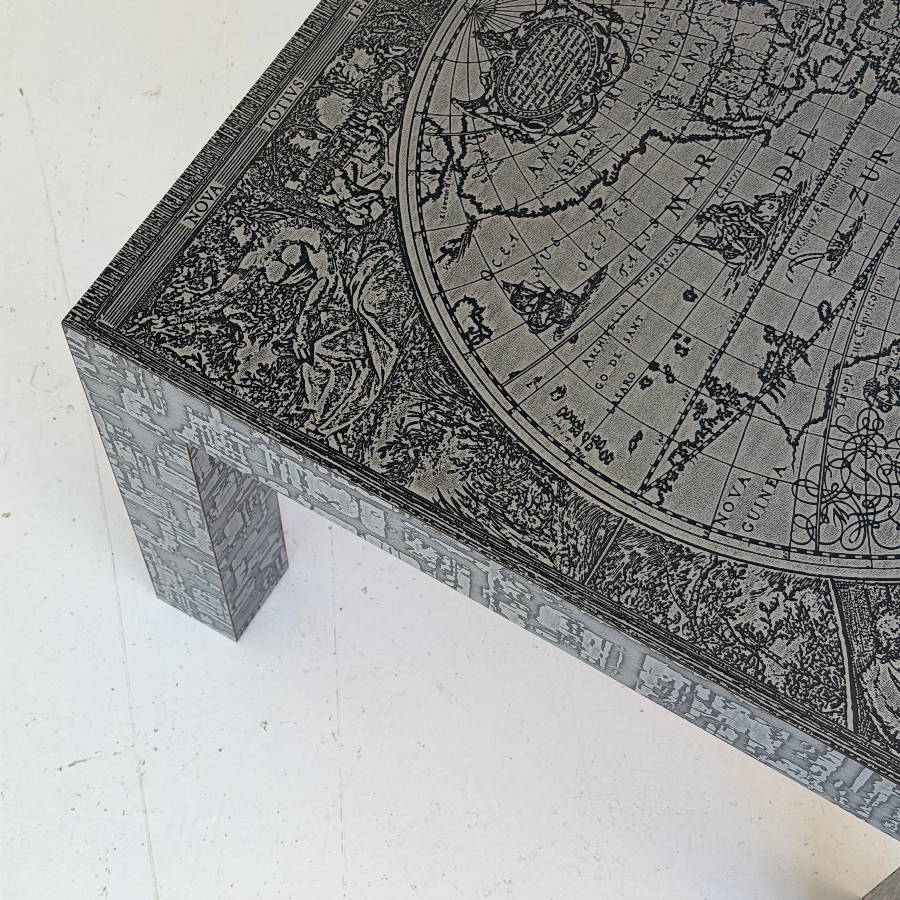 Embossed Map Motif Metal Laminate Coffee Table