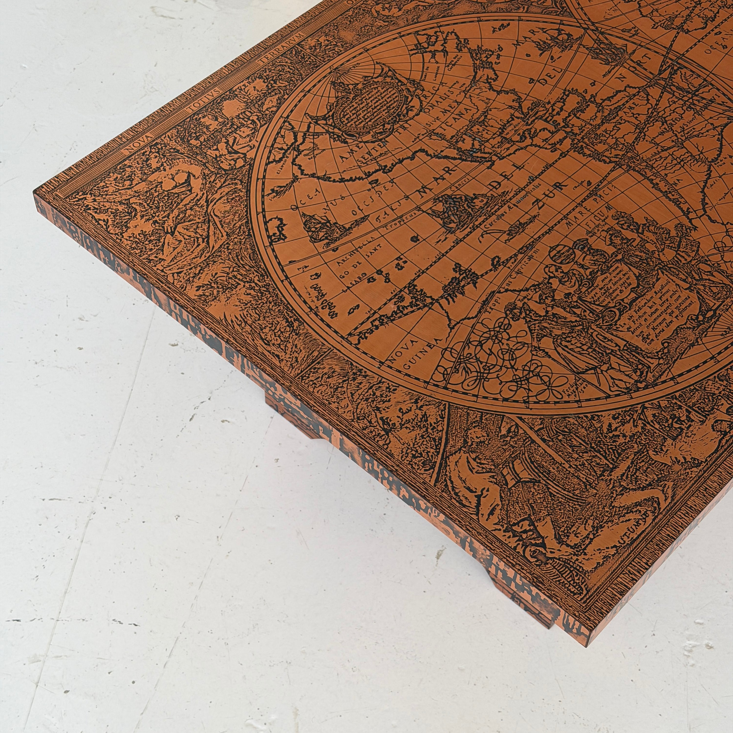 Embossed Map Motif Copper Laminate Coffee Table