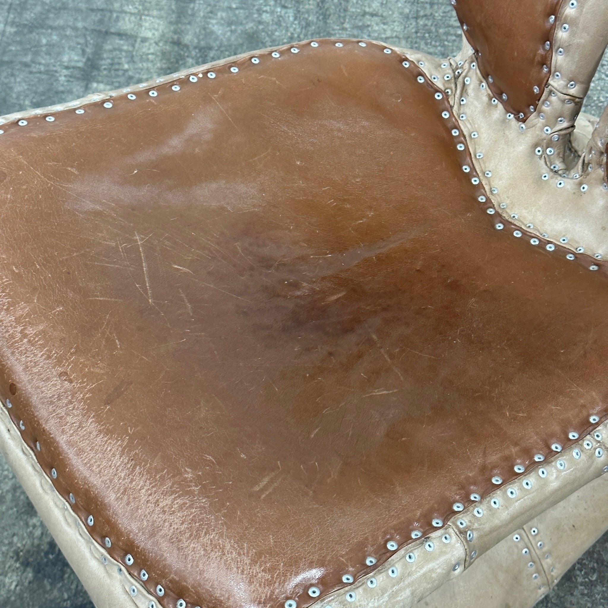 Riveted Saddle Leather Lounge Chair